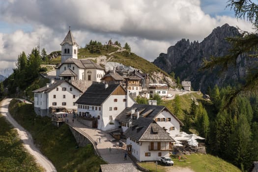 Monte Lussari, Italy - September 14th, 2019: View over the small village and the pilgrimage church of the Sanctuary of Monte Lussari at 1790 m.