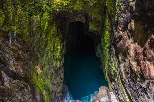 The source bassin of the river Soca, a littlebit hidden in the rocks of Trenta Valley in the Triglav National Park of Slovenia.