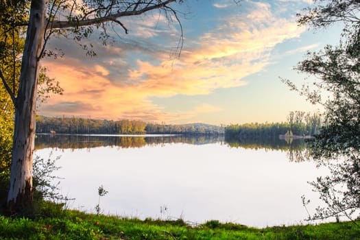 The Piedra Aguda Reservoir is a man-made lake located in the Badajoz province of Extremadura, Spain. It is the largest reservoir in the Llanos de Olivenza comarca (region). The reservoir was created in 1956 by damming the Olivenza River. It has a capacity of 16.3 cubic hectometers (13,240 acre-feet) and a surface area of 2.7 square kilometers (1.0 square mile). The reservoir is used for irrigation, drinking water supply, and recreation.