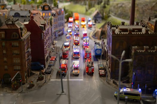 Miniatur Wunderland Hamburg in Germany, fire brigade department extinguishes fire, burning house, museum with miniature model construction of the world, 12.12.2023