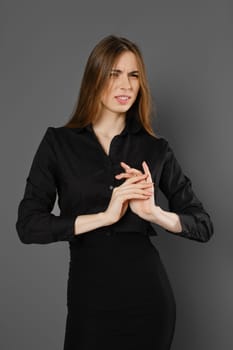 Problem of office workers with tunnel syndrome. Woman feels pain in her wrists.