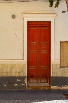 Old wooden door on a house on the Canary Island of Gran Canaria in Spain