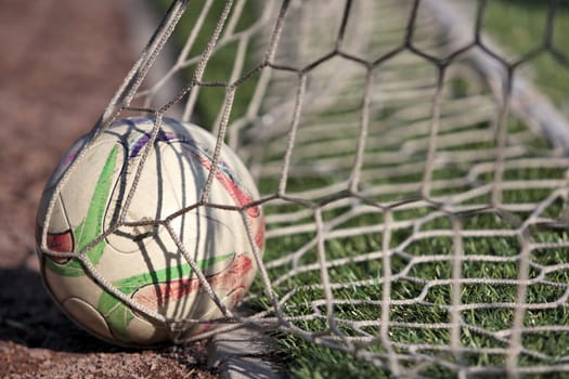 football ball scored into the net