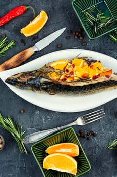 Roasted mackerel fish with oranges.