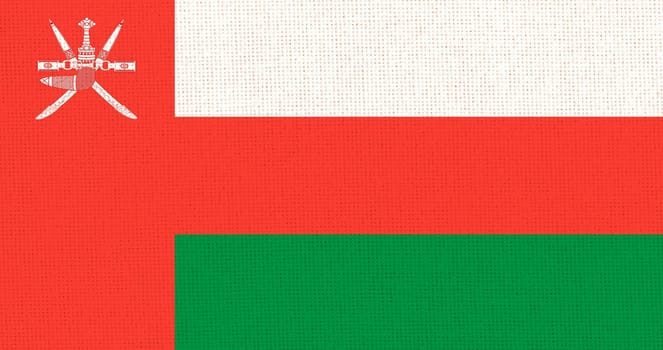 Flag of Sultanate of Oman. Oman flag on fabric surface. Fabric texture. National symbol of Oman. Arabian Peninsula. Arabian Peninsula. Asian country