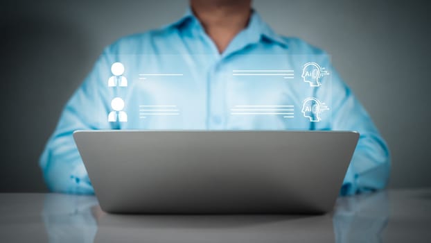 Businessman use computer technology to type live chat with intelligent computer to find information, ask, answer with an artificial intelligence system, chatbot, Ai assistant.