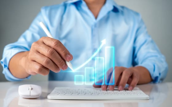 Stock market, Business growth, progress or success concept. Businessman or trader is showing a growing virtual hologram stock, invest in trading.