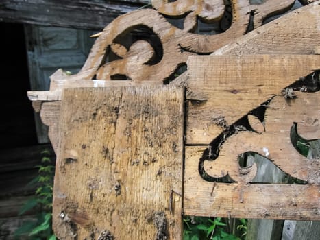 The device of a wooden clypeus. Clypeus window.
