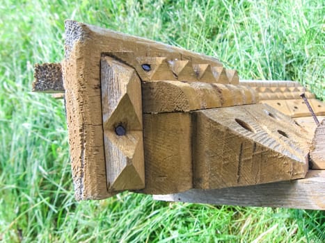 The device of a wooden clypeus. Clypeus window.