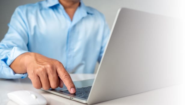 Businessman using computer to login represents protection concept of cyber security and data security including secure login.