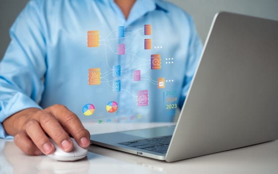 Business people use computers to analyze business and manage corporate data, business analytics with charts, metrics and KPIs to improve organizational performance, marketing, financial organization strategy.