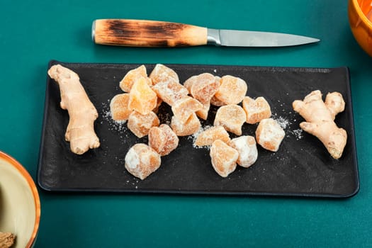 Sugared candied ginger ginger dessert. Healthy sweets.