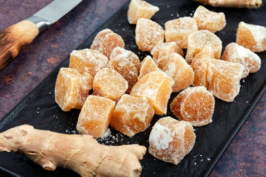 Sugared candied ginger ginger dessert. Healthy sweets.