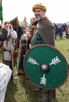 Krakow, Poland - April 11, 2023: Unidentified participants of Rekawka - Polish tradition, celebrated in Krakow on Tuesday after Easter. Currently has the character of festival historical reconstruction