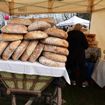 Krakow, Poland - April 11, 2023: Freshly baked traditional bread at a street stall