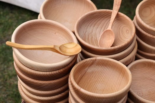 Cracow, Poland - April 11, 2023: Imitations of old wooden vessels in knight camp at the festival of historical reconstruction
