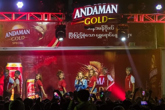 Sagaing, Myanmar - January 15th, 2019: Many people came for the performances at an Open Air Concert sponsored by a beverage company at a public square in the city