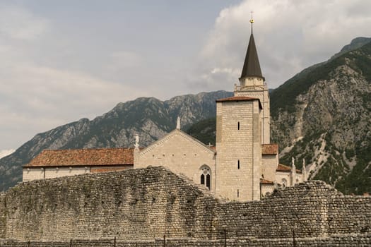 Complete view of St. Andrews Cathedral (Duomo di Sant'Andrea Apostolo) in Venzone, Italy. The cathedral was almost completely rebuilt after being destroyed in the desastrous earthquake of 1976.