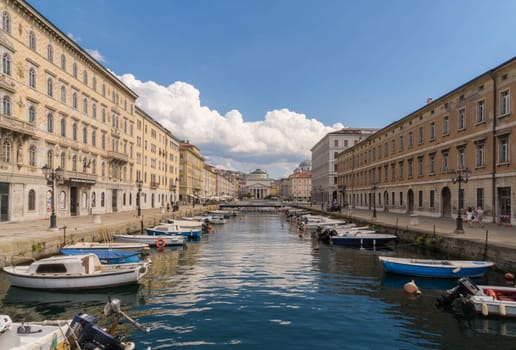 A view along the Canal Grande over Ponte Rosso  to the Sant'Antonio Nuovo Church in Trieste in Northern Italy