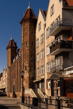 Morning view to the Mariacka Gate and the Archaeological Museum in Gdansk