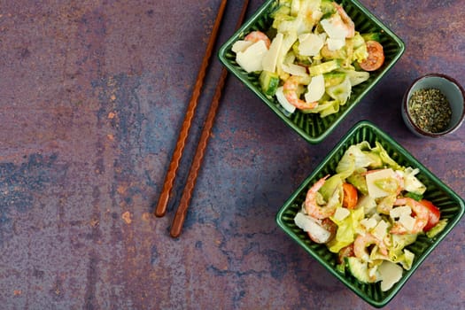 Salad with shrimp, prawns avocado and tomato. Healthy eating. Fresh Asian seafood salad. Copy space.