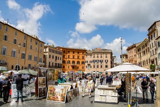 Rome, Italy - June 11, 2012: The eternal city of Rome, Roman streets and buildings, modern and ancient architecture of Rome.
