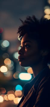 Close up of a young adult successful African American business woman looking at the night city with professional cinematic light. Neural network generated image. Not based on any actual person or scene.