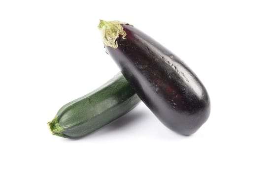 Eggplant and zucchini on white background