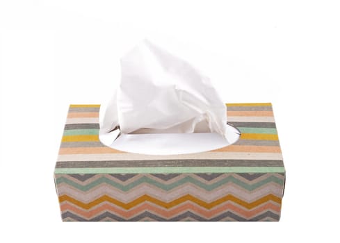 Cardboard box with paper towels isolated on white background