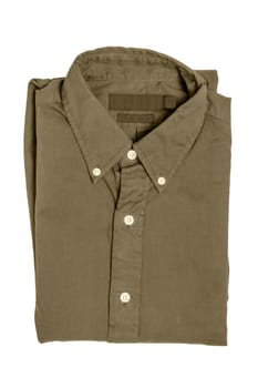 Folded clothes. Close-up of a new sepia business shirt isolated on a white background. Mens shirt. Clipping path. Summer fashion. Background texture with space.