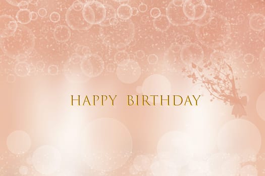 Happy birthday card design with a golden font and a light golden brown abstract background with flowers. Greeting card.