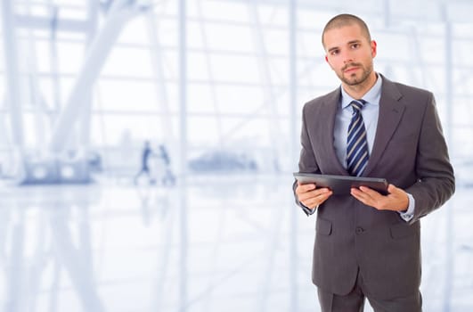 worried businessman with a tablet pc, at the office