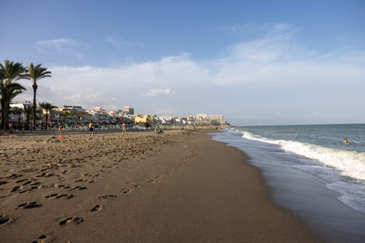 Torremolinos, Spain - September 15, 2023:  La Carihuela beach in Torremolinos, Malaga, Costa del Sol, Spain