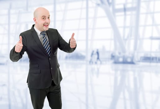 young business man going thumb up, at the office