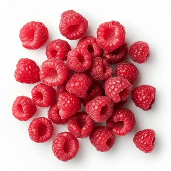 Close-up of fresh, juicy raspberries on a white background