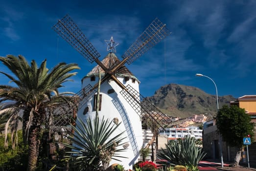 Costa Adeje, Tenerife, Spain - July 28, 2013: The islands of Tenerife is a resort for tourists. Coast of the sea and hotels on the beach.