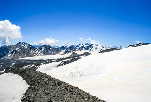 Mountain landscape with snow. Snow in the mountains. Mountain landscape.
