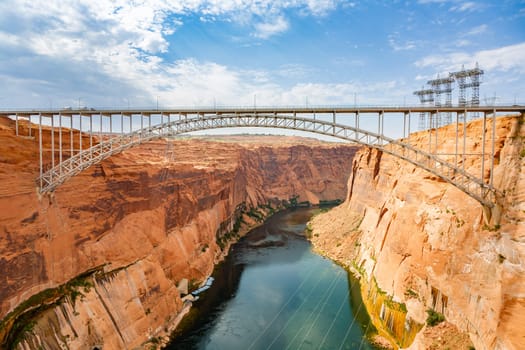 old iron Bridge at Glen Canyon dam spanning river Colorado