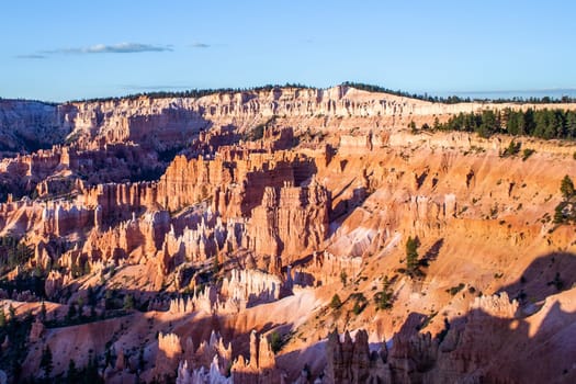 beautiful landscape in Bryce Canyon with magnificent Stone formation like Amphitheater, temples, figures in Morning light
