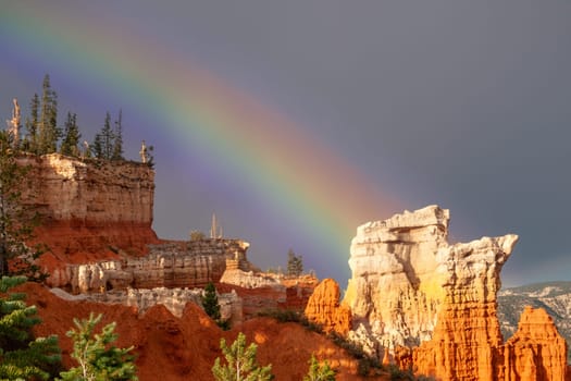 Bryce canyon with spectacular hoodoos in sunrise with rainbow