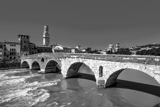 the old roman bridge Ponte di Pietra in Verona  spans the river Etsch - without people