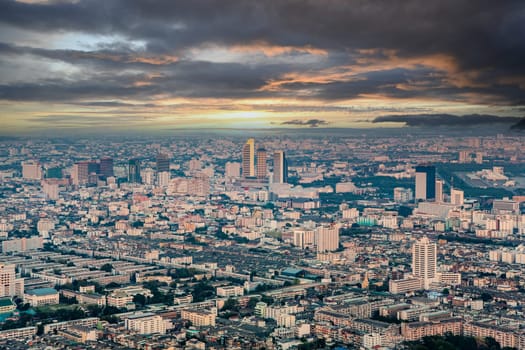 View across Bangkok skyline showing office blocks and condominiums