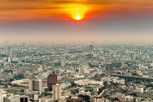 aerial of Bangkok skyline showing in sunset