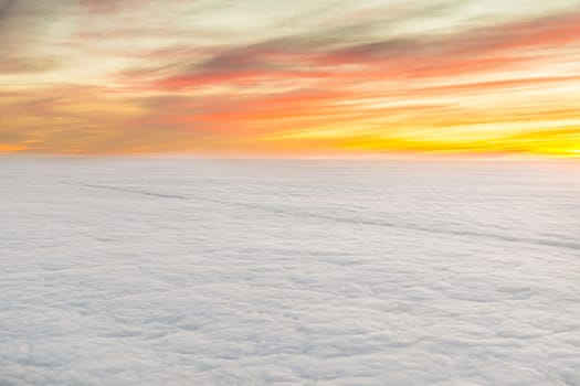 aerial of scenic sunrise with  white puffy clouds