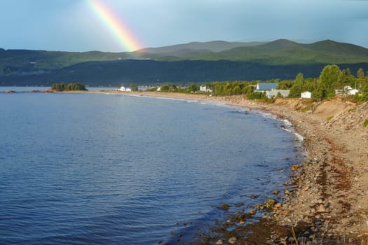 scenic sandy empty coast at Nova Scotia in Canada with view to coastal landscape in Baddeck, Canada