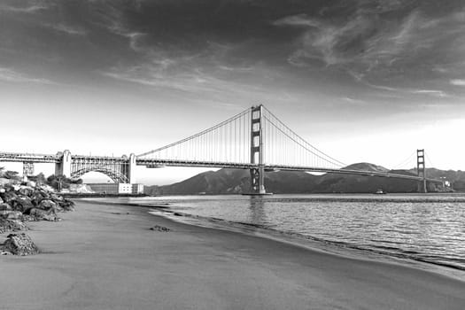 scenic morning view to golden gate bridge from the beach at old fort, USA