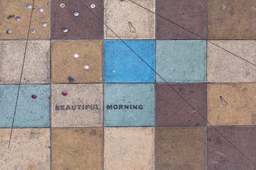 tiles at the floor with letters beautiful morning in Oakland
