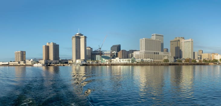 scenic view to New Orleans skyline in morning light from river Mississippi, Louisiana, USA
