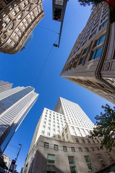fisheye view of historic skyscraper in old town od Dallas under blue sky.