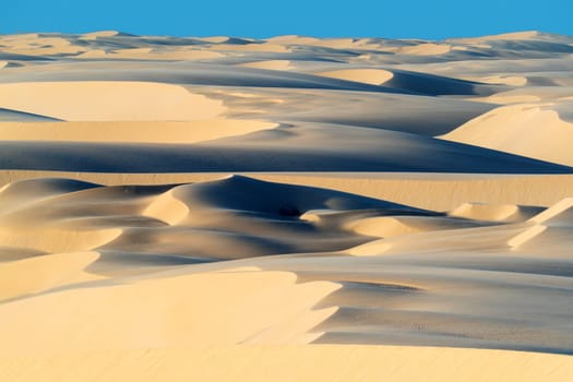 scenic desert dune landscape Lencois Maranhenses National Park - Parque Nacional dos Lencois Maranhenses in northeastern Brazil, just east of the Baía de Sao Jose